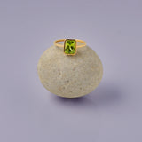 14kt yellow gold and emerald cut Peridot ring. Size 9, ready to ship