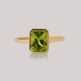 14kt yellow gold and emerald cut Peridot ring. Size 9, ready to ship