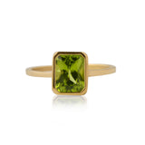 14kt yellow gold and emerald cut Peridot ring. Size 9, ready to ship